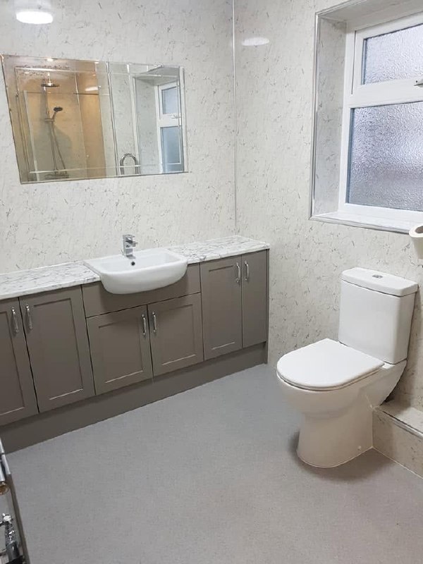 Complete bathroom vanity and toilet installation